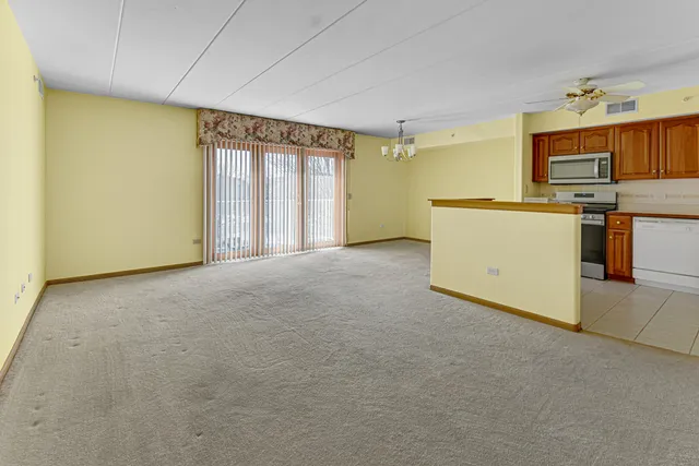 a view of a kitchen with a sink