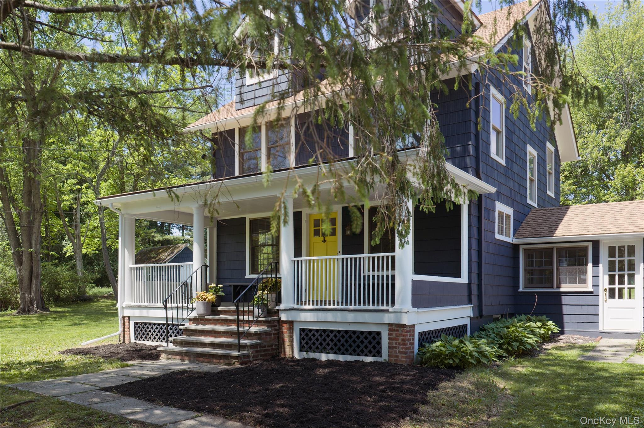 185 Verbank Village Road Millbrook, NY 12545 - Photo 1 of 22 front view of a house with a yard