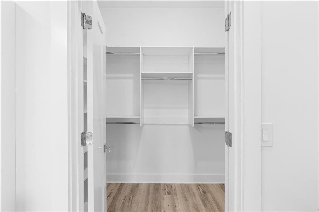 1155 Custer Avenue Southeast, Unit 301 Atlanta, GA 30316 - Photo 13 of 22 a view of walk in closet with empty racks