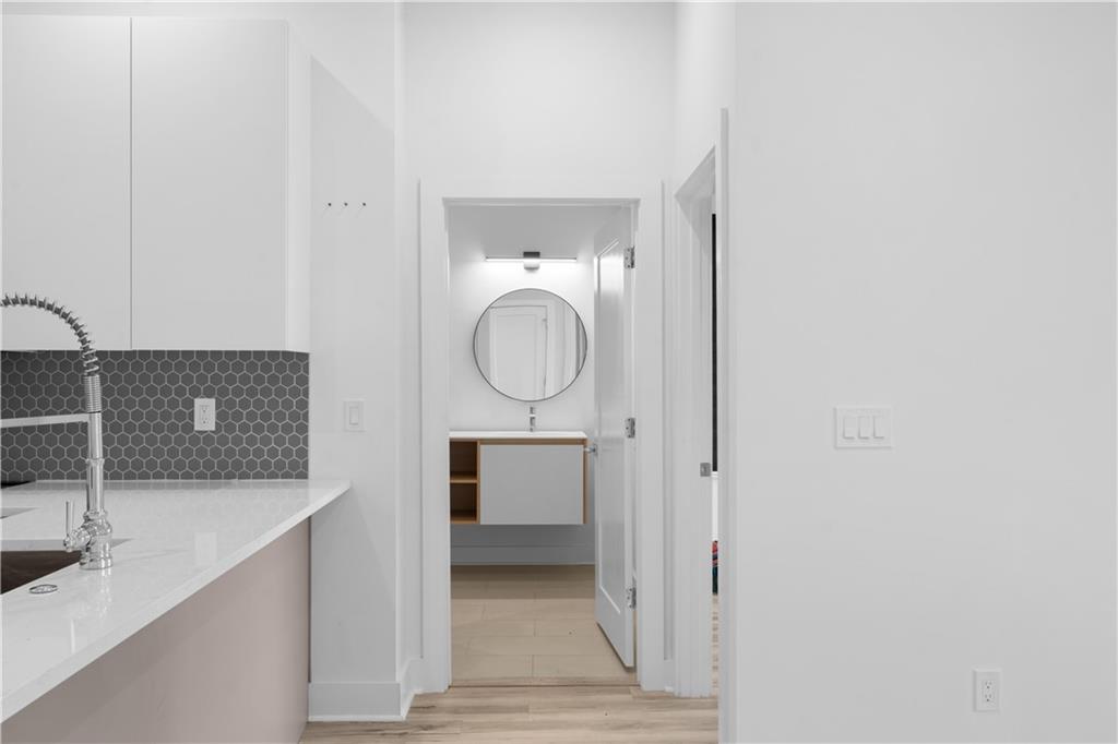 1155 Custer Avenue Southeast, Unit 301 Atlanta, GA 30316 - Photo 15 of 22 a view of hallway with washer and dryer