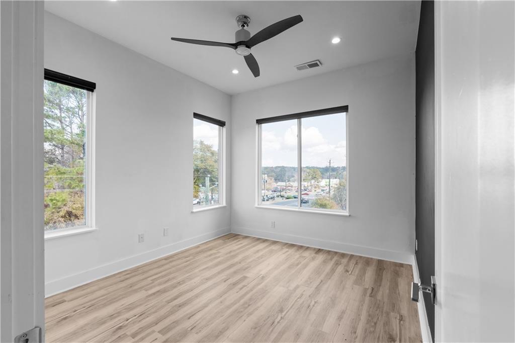 1155 Custer Avenue Southeast, Unit 301 Atlanta, GA 30316 - Photo 16 of 22 a view of an empty room and a window