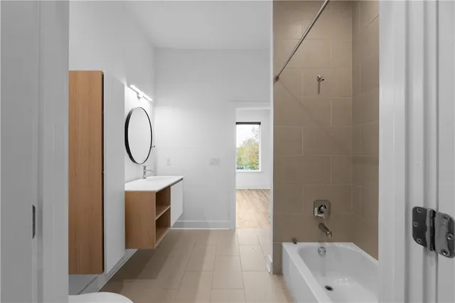 a close view of walk in closet with empty racks