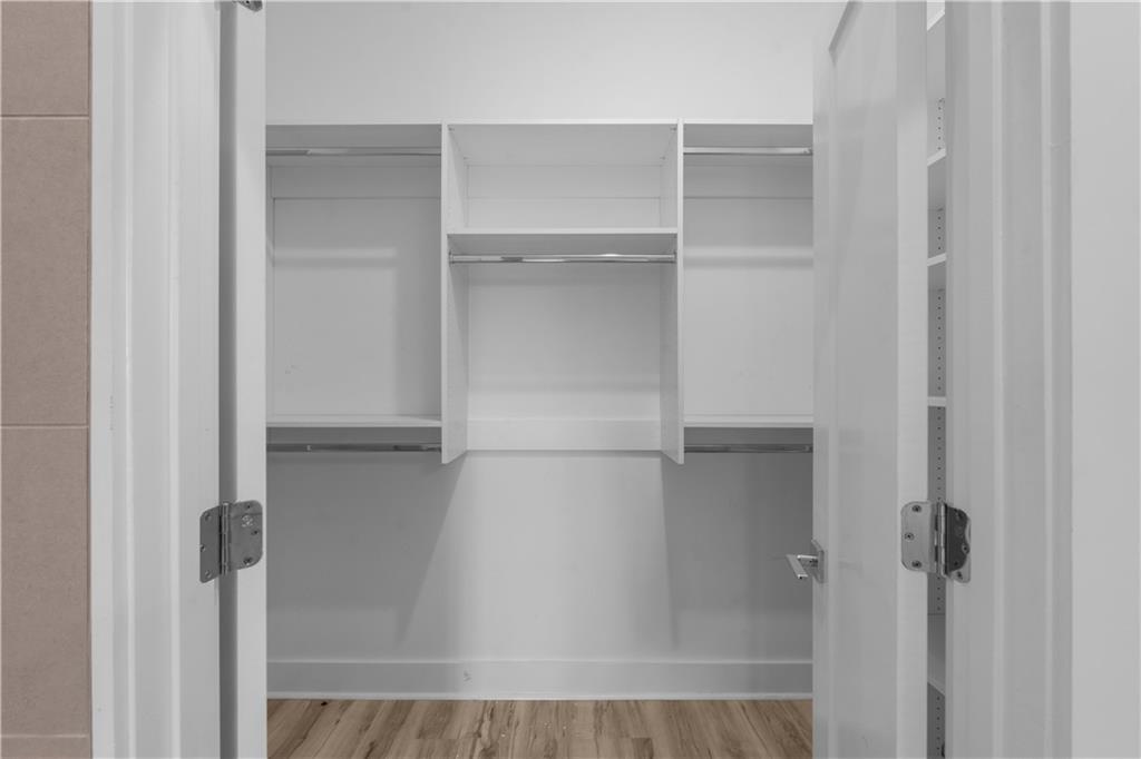1155 Custer Avenue Southeast, Unit 301 Atlanta, GA 30316 - Photo 21 of 22 a close view of walk in closet with empty racks