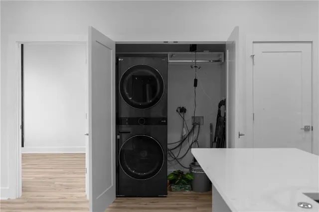 a view of a livingroom with wooden floor