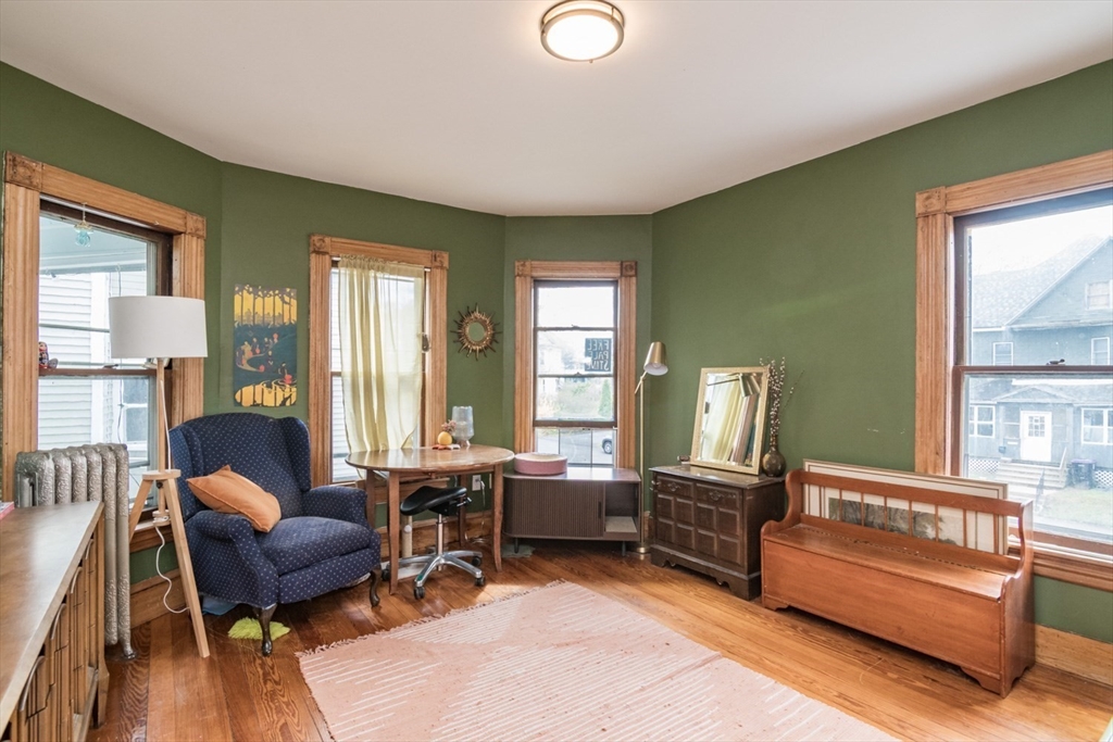 25 Morgan Street Holyoke, MA 01040 - Photo 16 of 41 a living room with furniture and a large window