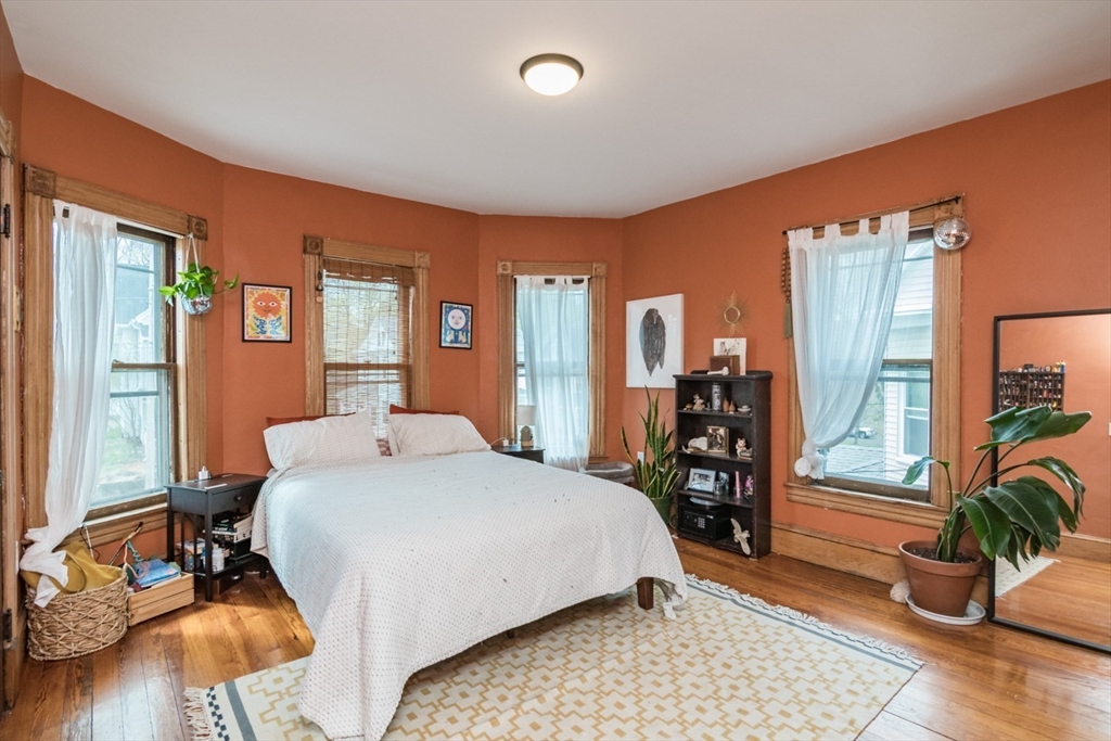 25 Morgan Street Holyoke, MA 01040 - Photo 18 of 41 a bedroom with a large bed and a large window