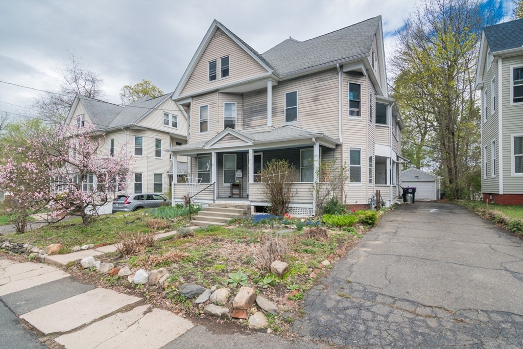 25 Morgan Street Holyoke, MA 01040 - Photo 2 of 41 a front view of a house with garden