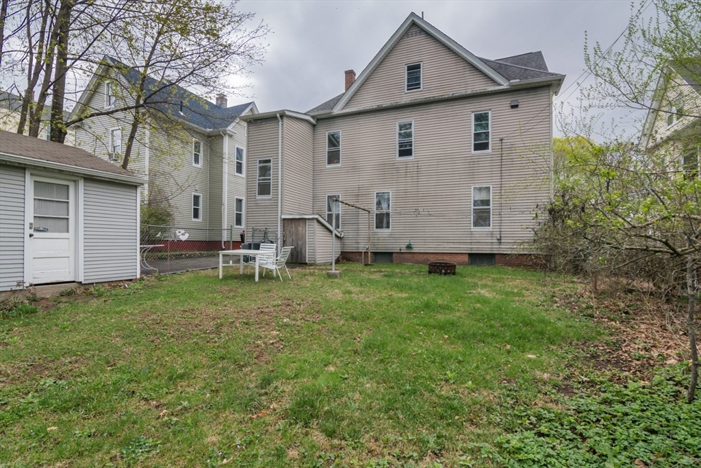25 Morgan Street Holyoke, MA 01040 - Photo 35 of 41 a view of a house with backyard