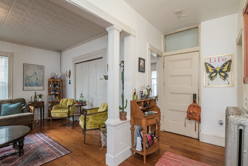 25 Morgan Street Holyoke, MA 01040 - Photo 6 of 41 a living room with furniture and wooden floor