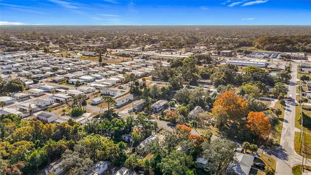 an aerial view of residential house with parking space