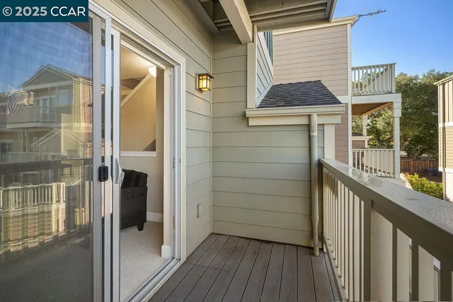a view of a door and a street view