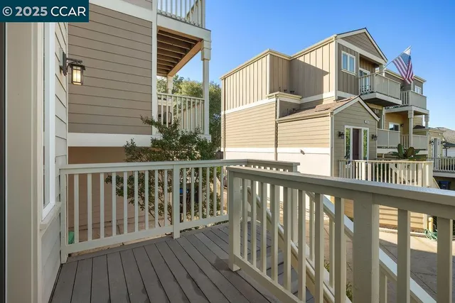 a view of a brick house with a large window