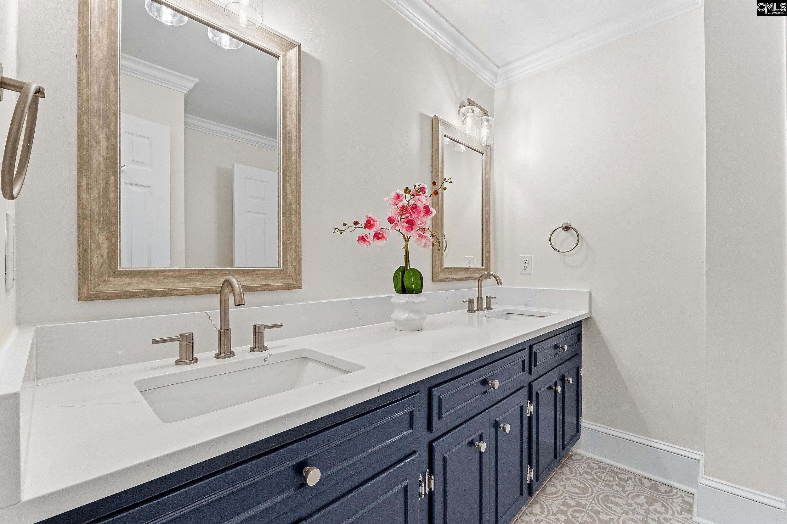 121 Silver Lake Road East Columbia, SC 29223 - Photo 33 of 57 a bathroom with a sink and a mirror