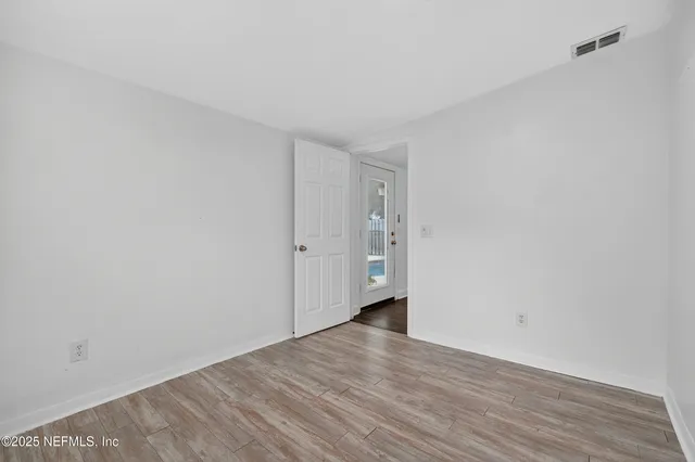 a swimming pool with outdoor seating yard and plants