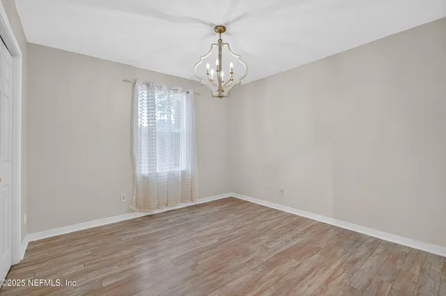 a view of a livingroom with wooden floor