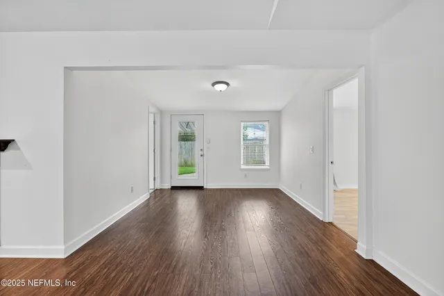 an aerial view of a house with yard swimming pool and outdoor seating