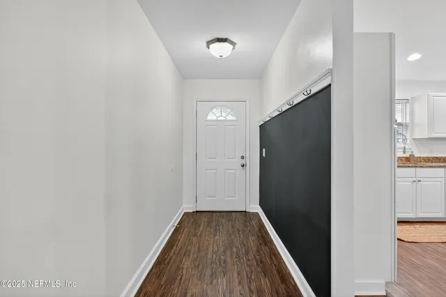 an aerial view of residential house with outdoor space