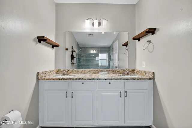 a view of a dining room with furniture and window