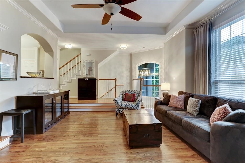 248 Westcott Street Houston, TX 77007 - Photo 13 of 32 a living room with fireplace furniture and a large window