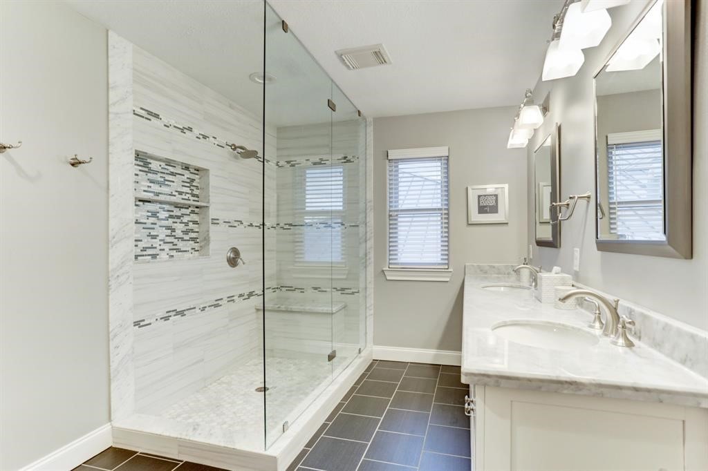 248 Westcott Street Houston, TX 77007 - Photo 32 of 32 a bathroom with a shower and a sink
