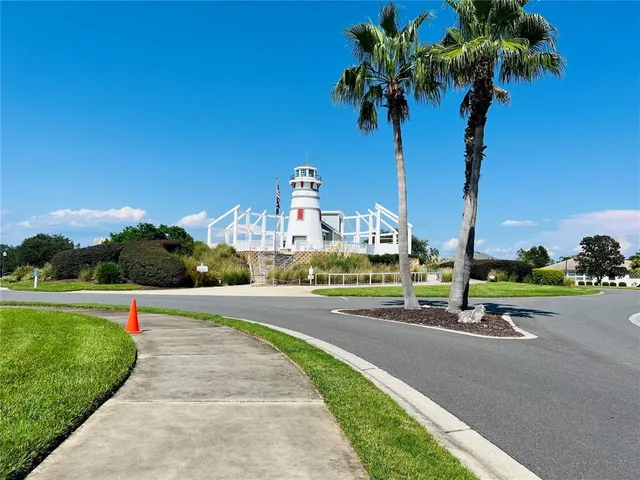 a park with lots of tress in the background
