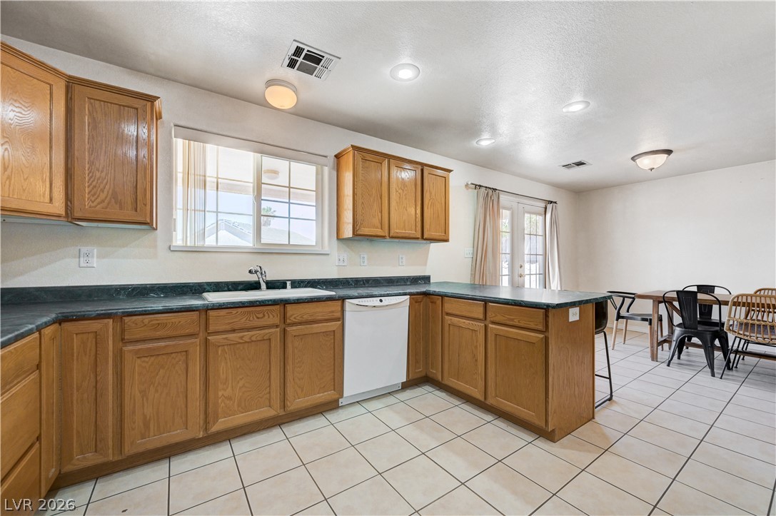 1272 Liston Avenue Logandale, NV 89021 - Photo 23 of 61 A functional kitchen boasts ample cabinetry and a practical layout for daily living.