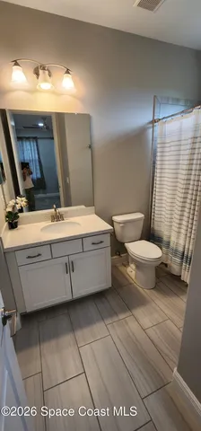 a view of a room with an empty space