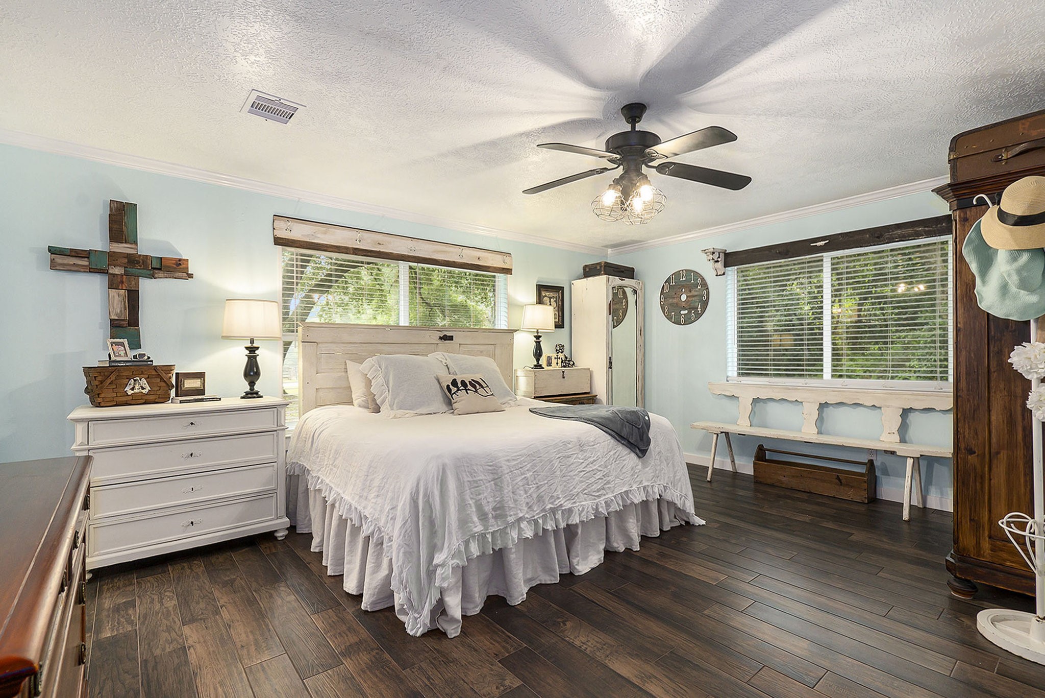 7363 County Line Road Willis, TX 77378 - Photo 25 of 34 Bright and inviting primary bedroom featuring abundant natural light and a spacious walk-in closet.