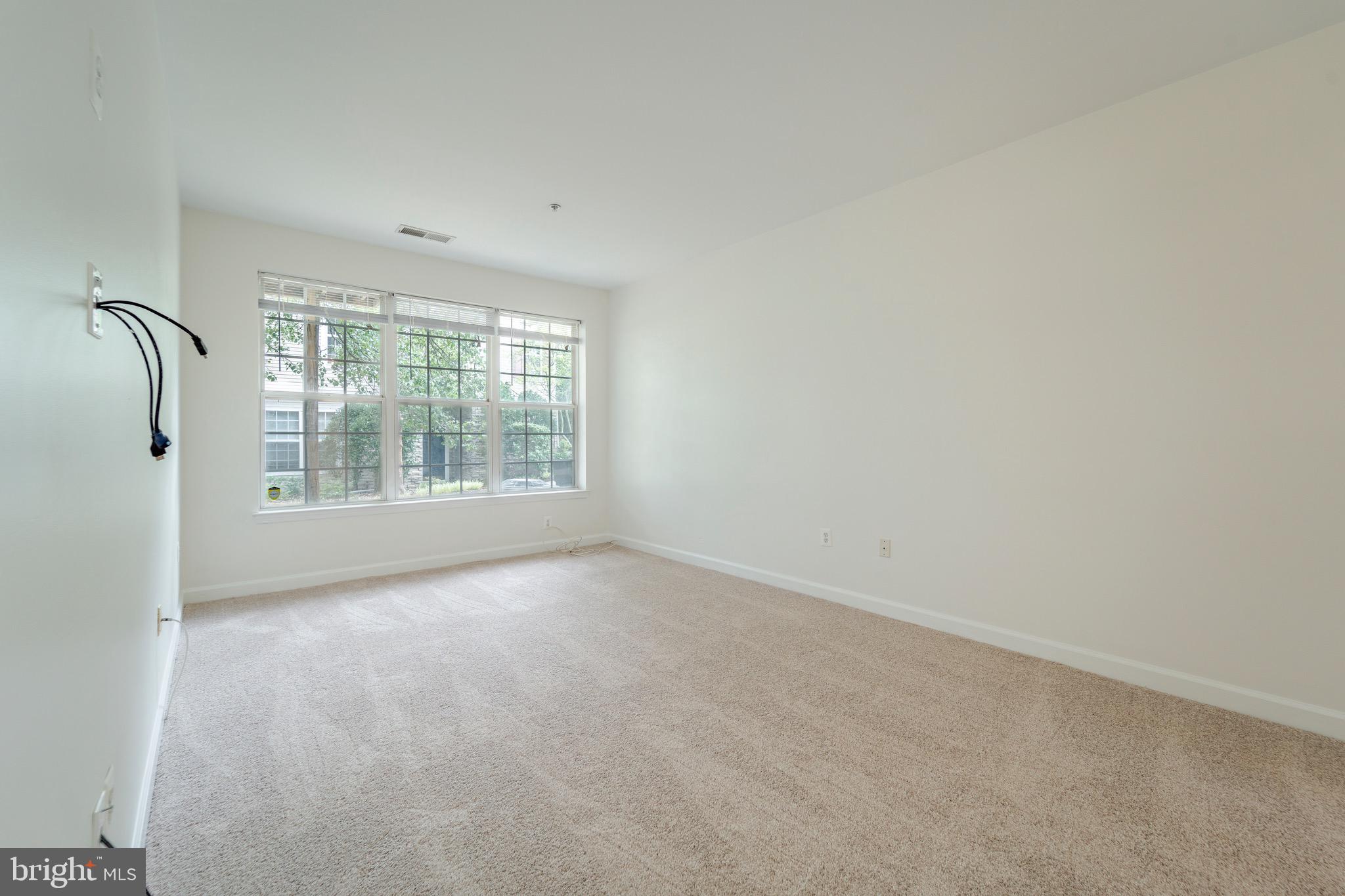 8611 Willow Leaf Lane Odenton, MD 21113 - Photo 14 of 33 an empty room with windows