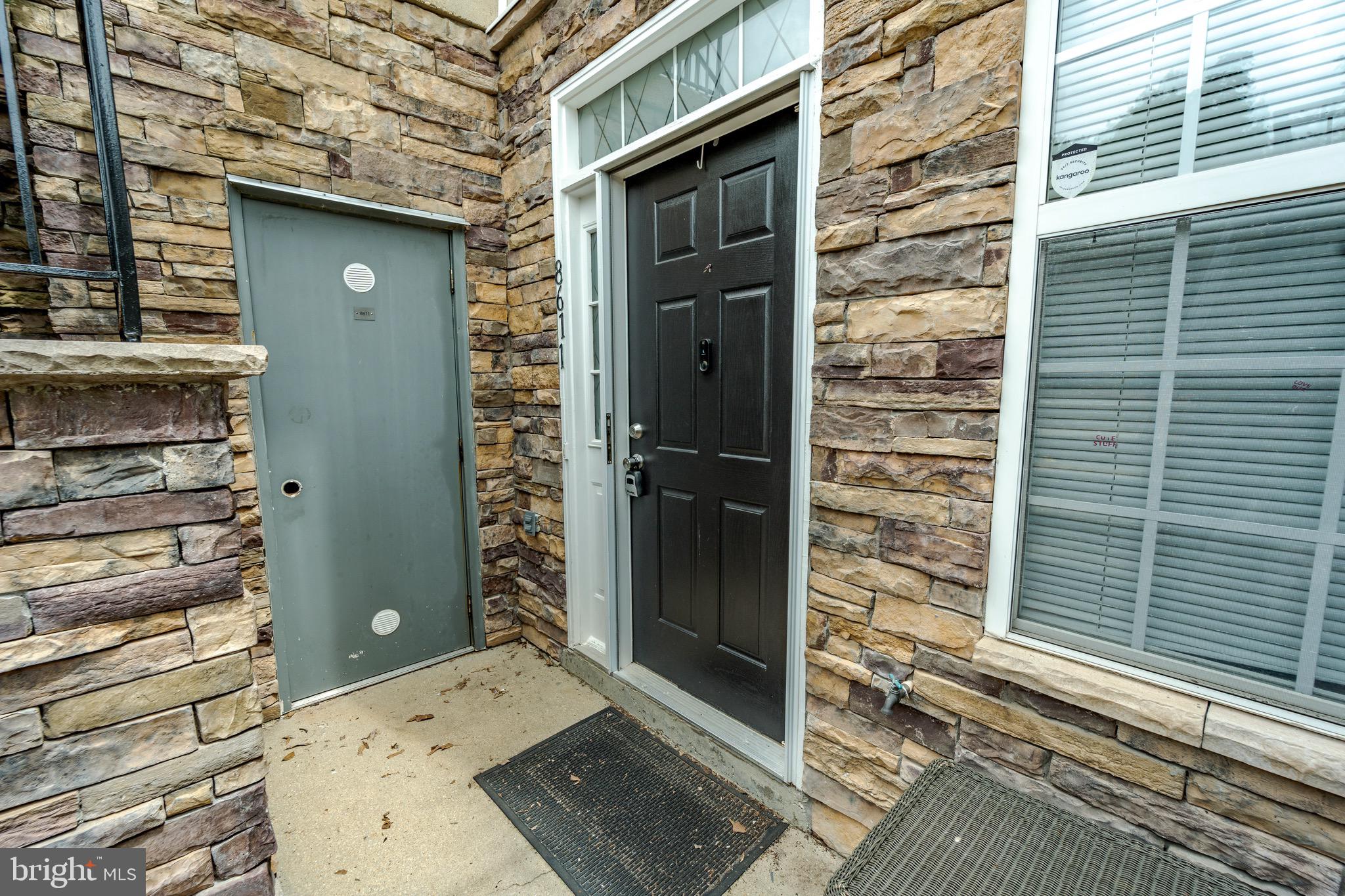 8611 Willow Leaf Lane Odenton, MD 21113 - Photo 30 of 33 a view of a door of the house