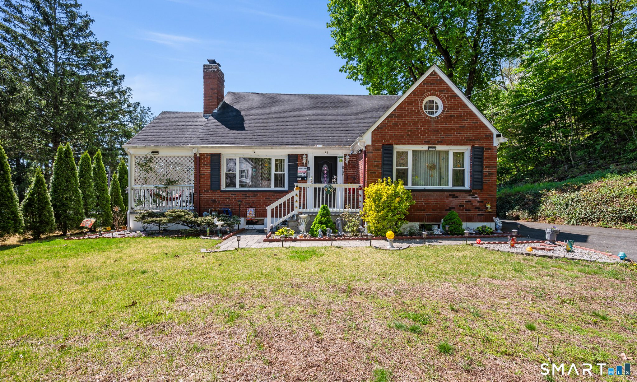 85 Dwight Street Ansonia, CT 06401 - Photo 1 of 40 a front view of a house with a yard