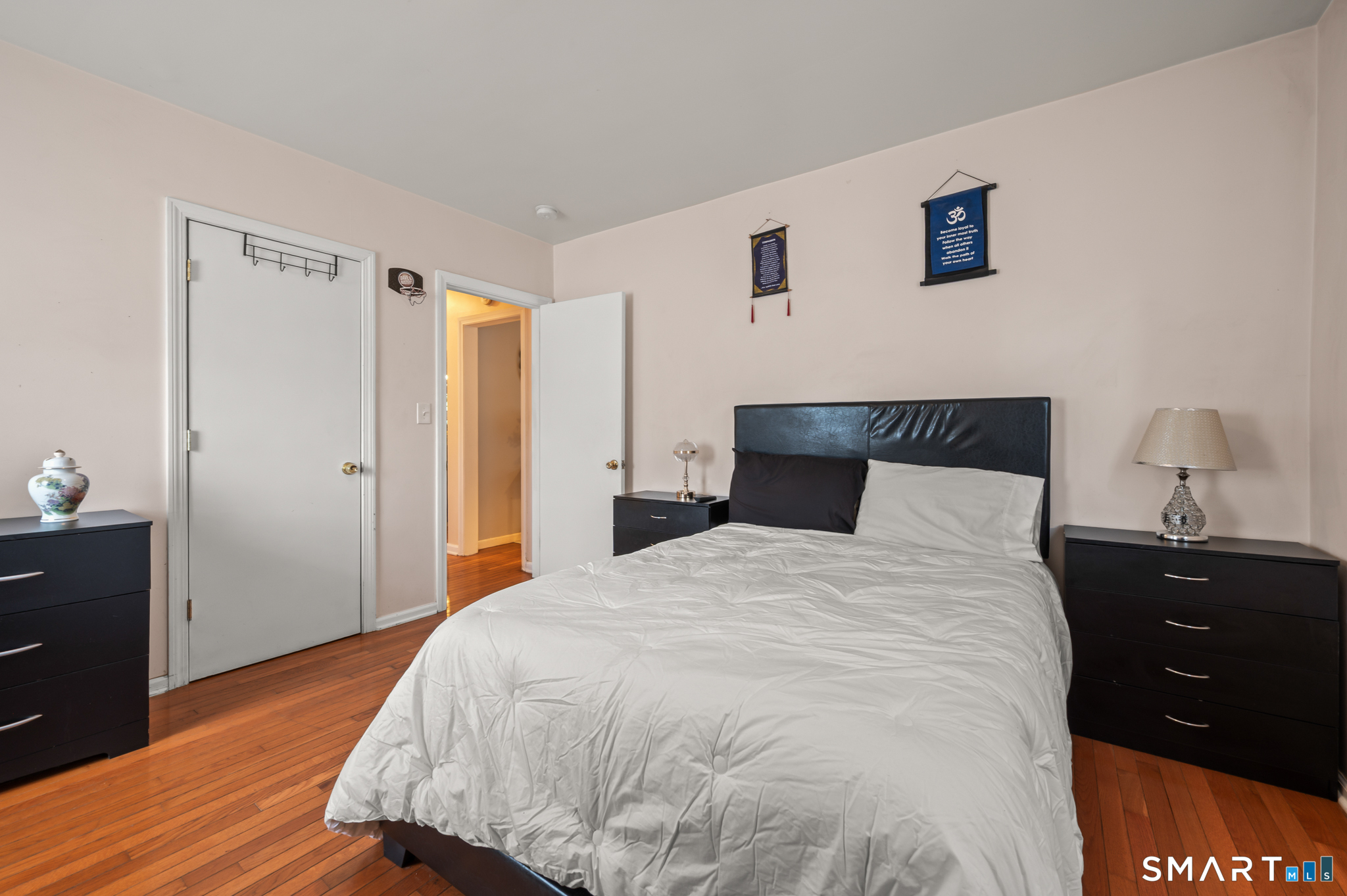 85 Dwight Street Ansonia, CT 06401 - Photo 16 of 40 a bedroom with a bed and a dresser