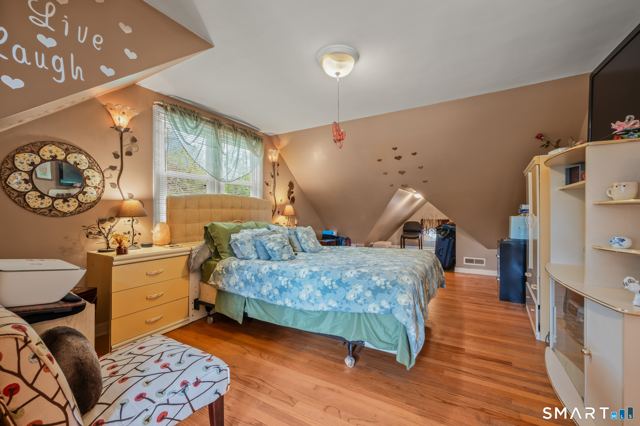 85 Dwight Street Ansonia, CT 06401 - Photo 18 of 40 a bedroom with a bed and wooden floor