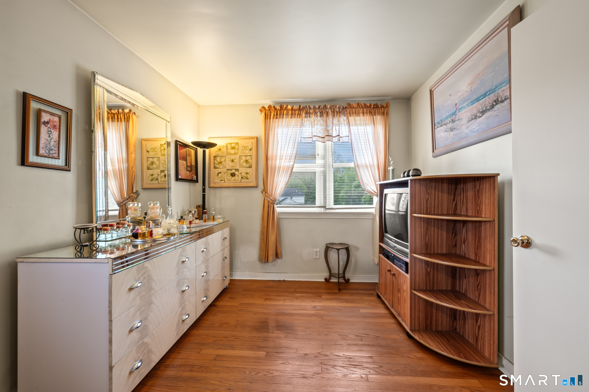 85 Dwight Street Ansonia, CT 06401 - Photo 23 of 40 a large white room with a large window and cabinets
