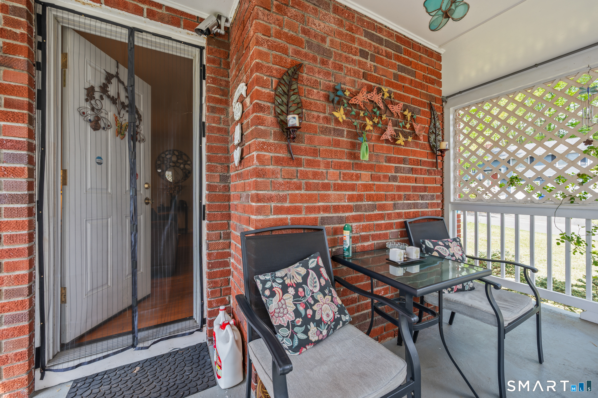 85 Dwight Street Ansonia, CT 06401 - Photo 26 of 40 a balcony with chairs and a potted plant