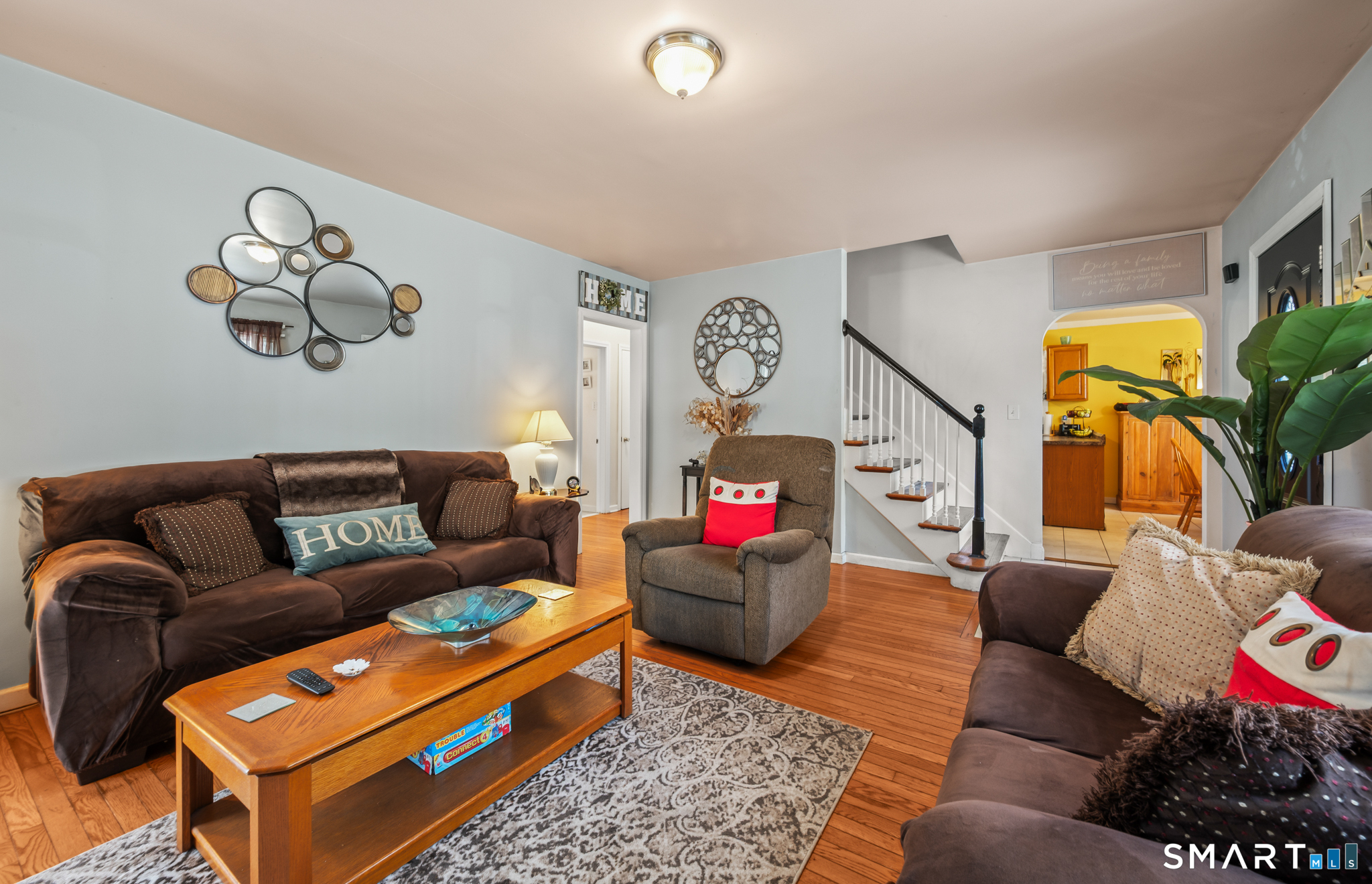 85 Dwight Street Ansonia, CT 06401 - Photo 3 of 40 a living room with furniture and a flat screen tv