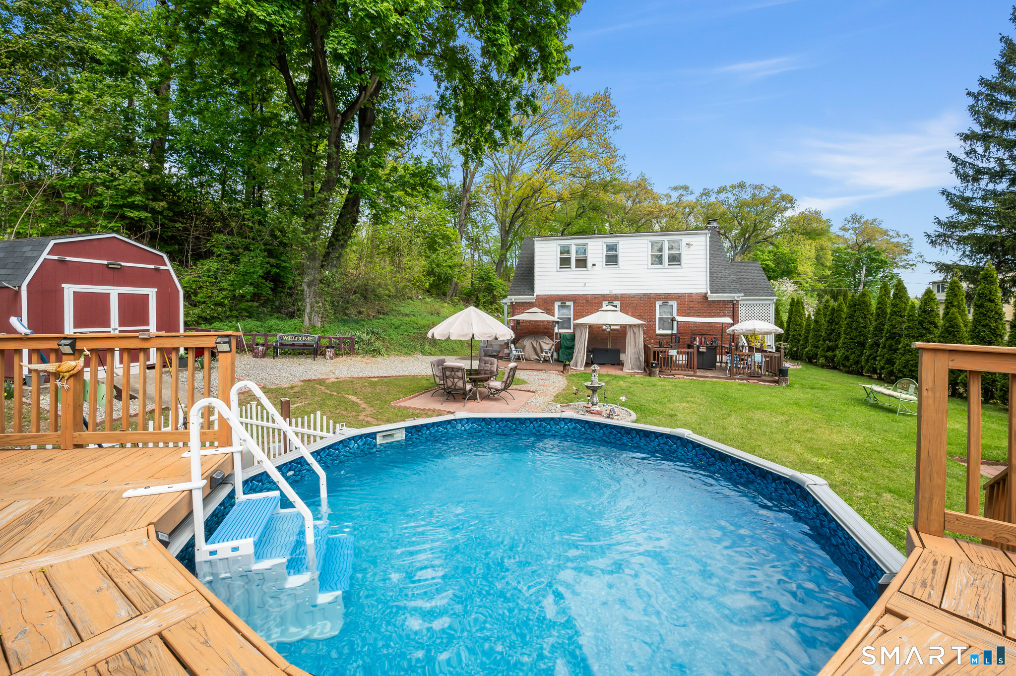 85 Dwight Street Ansonia, CT 06401 - Photo 34 of 40 a view of a swimming pool with a patio