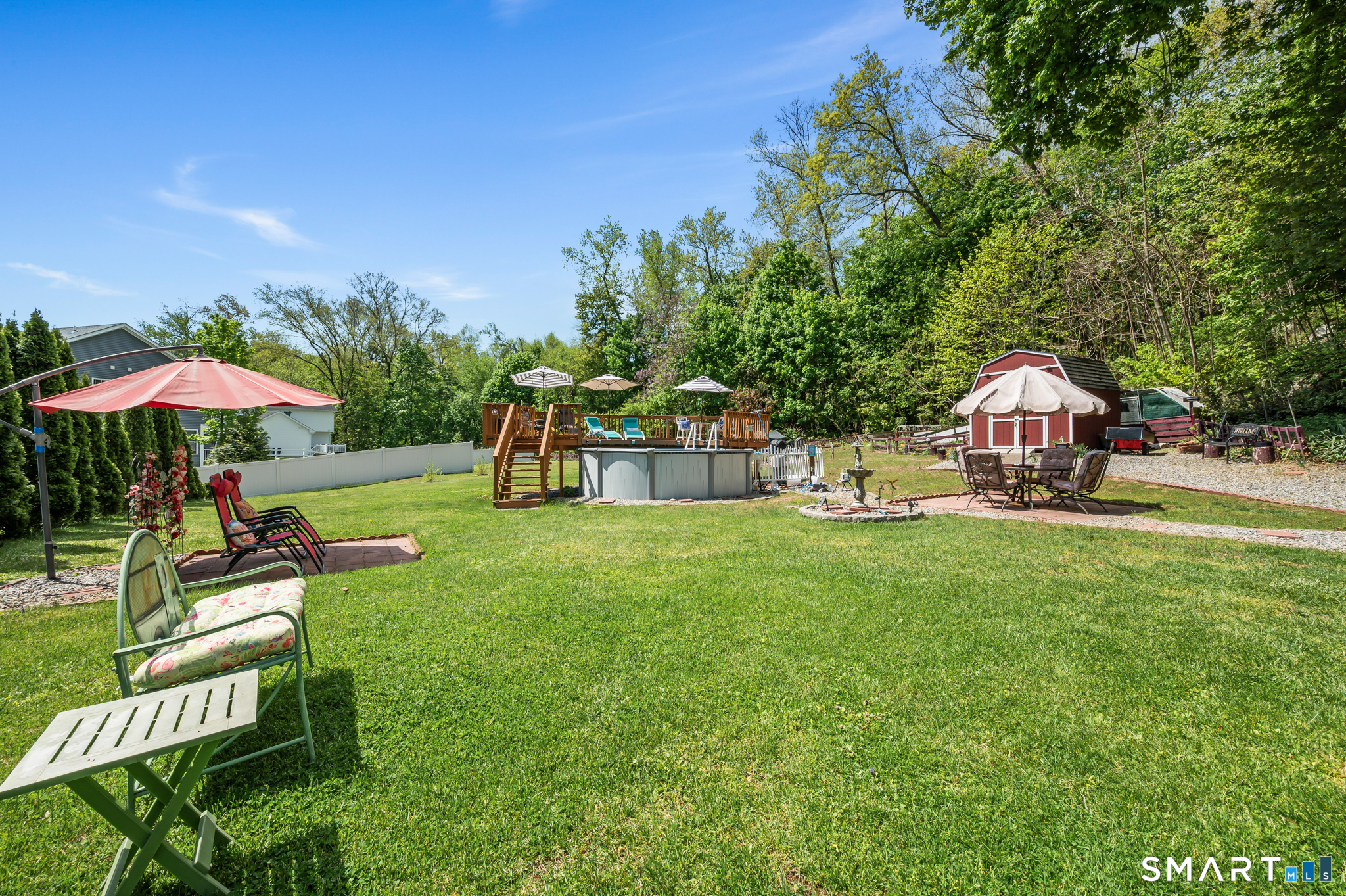 85 Dwight Street Ansonia, CT 06401 - Photo 35 of 40 a view of a house with backyard and sitting area