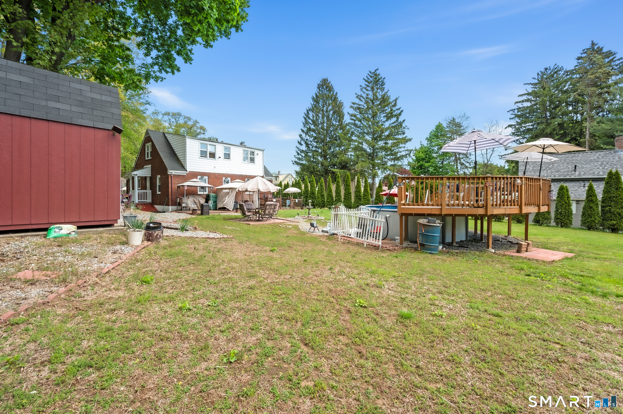 85 Dwight Street Ansonia, CT 06401 - Photo 39 of 40 a view of a house with backyard porch and sitting area