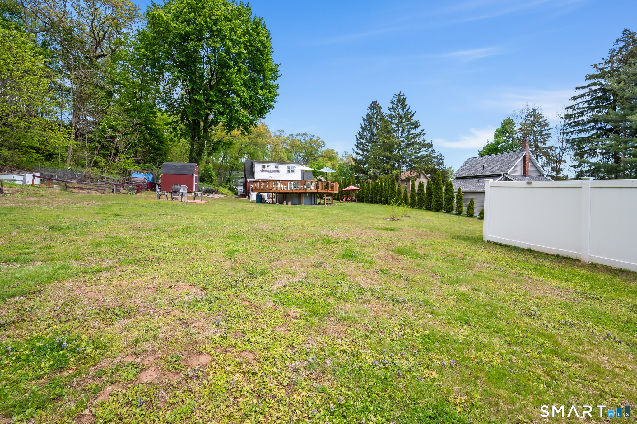 85 Dwight Street Ansonia, CT 06401 - Photo 40 of 40 a backyard of a house with table and chairs