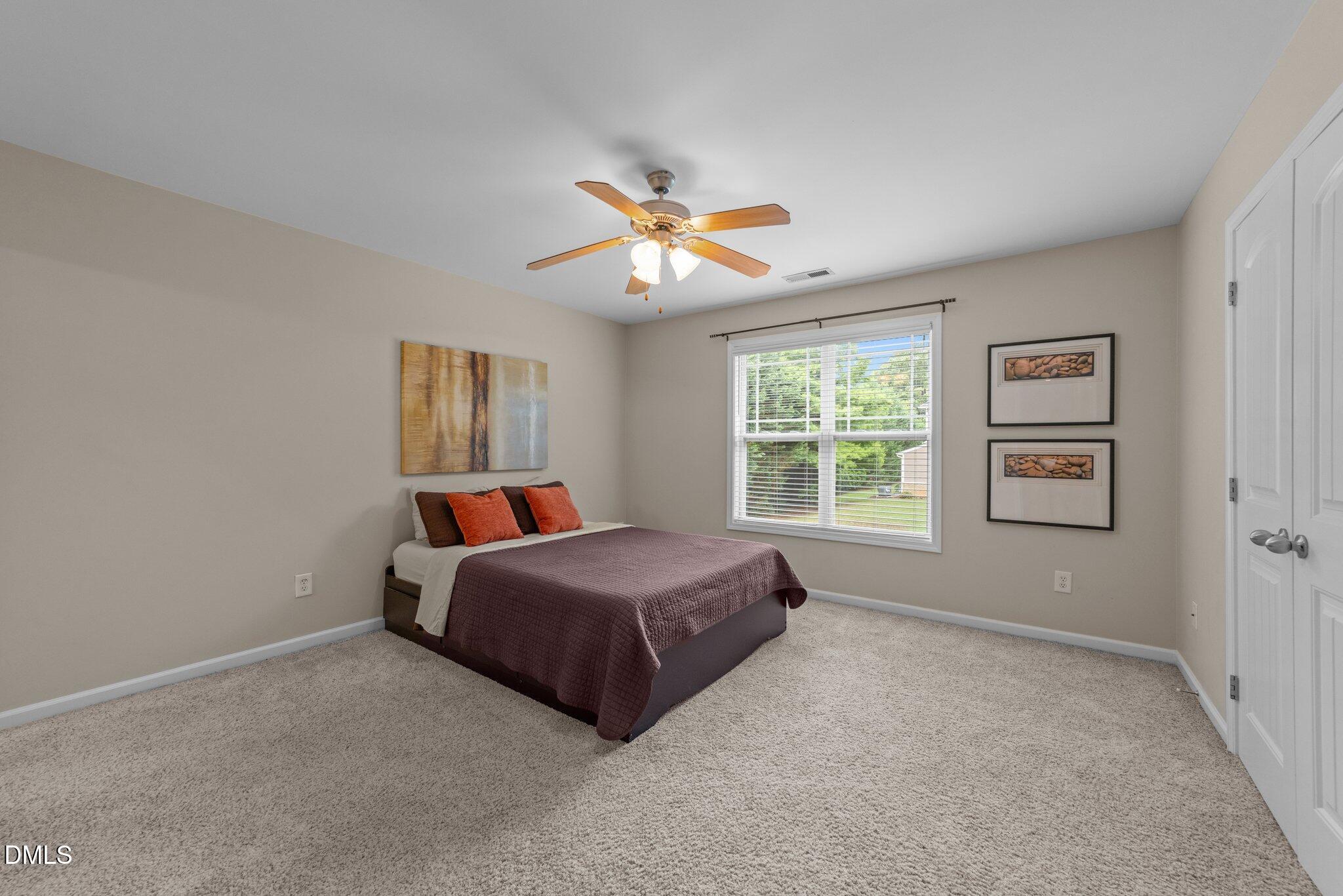 158 Pineland Circle Raleigh, NC 27606 - Photo 12 of 34 a room with a bed and a window