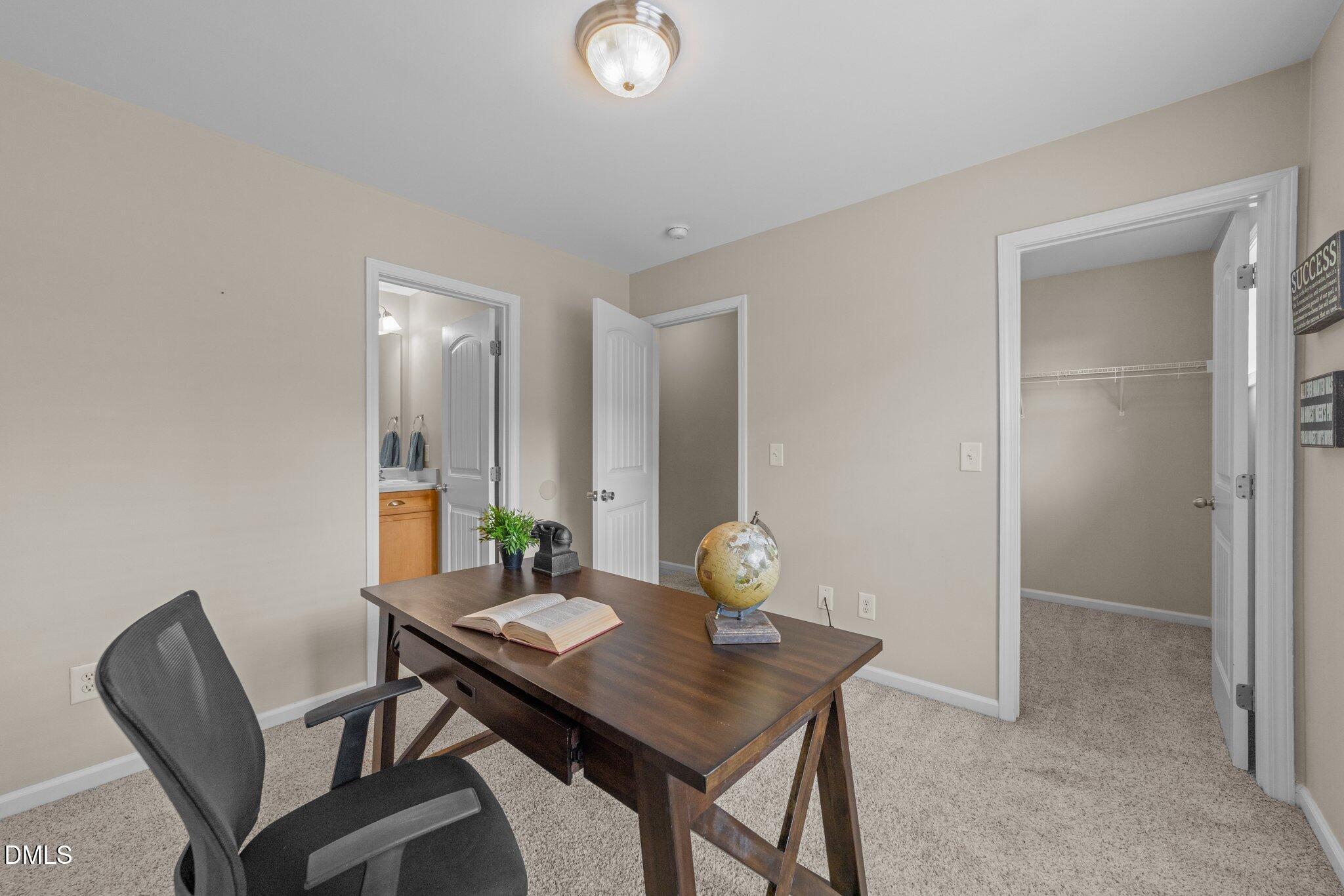 158 Pineland Circle Raleigh, NC 27606 - Photo 18 of 34 a view of a workspace dining room and wooden floor