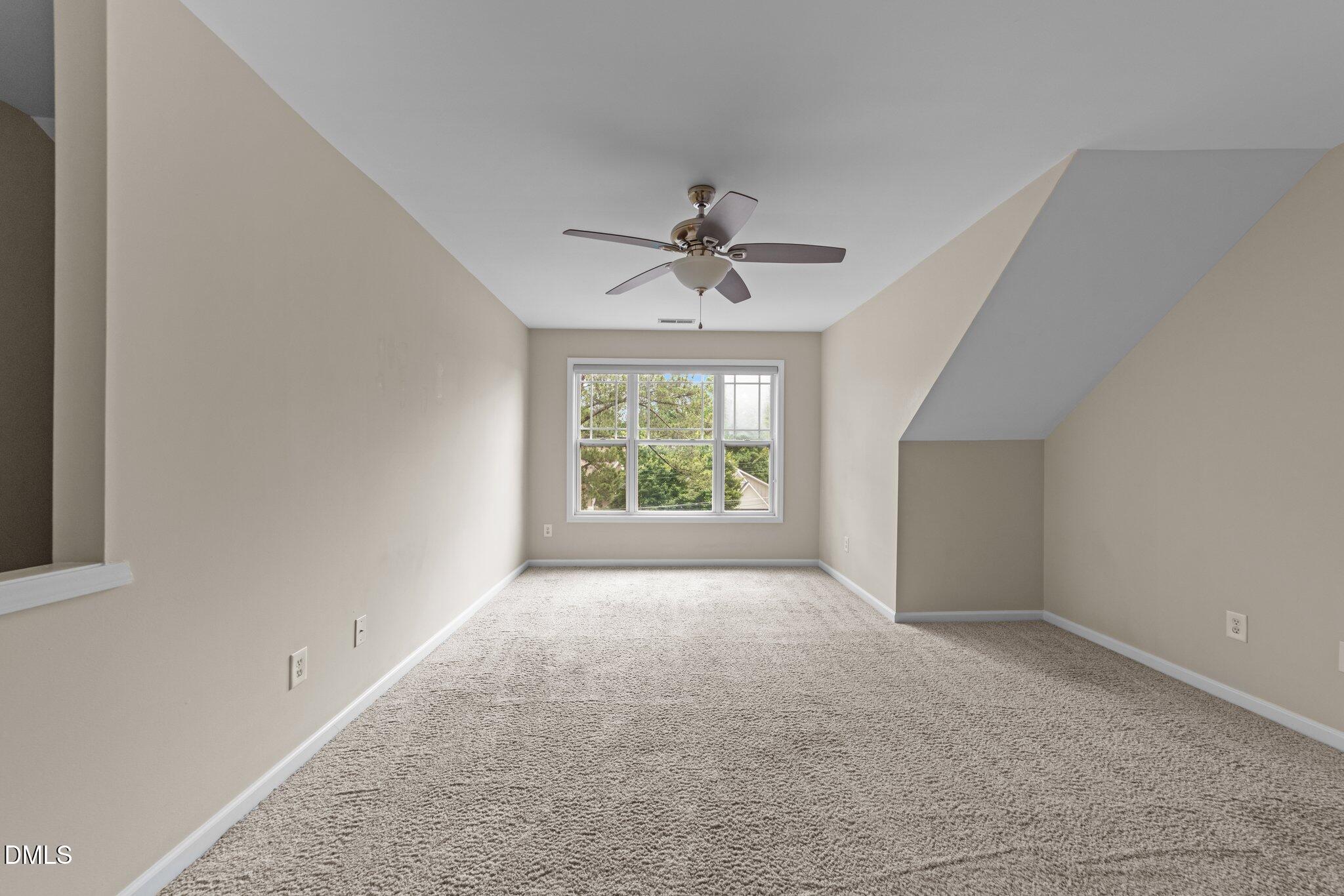 158 Pineland Circle Raleigh, NC 27606 - Photo 22 of 34 wooden floor in an empty room with a window