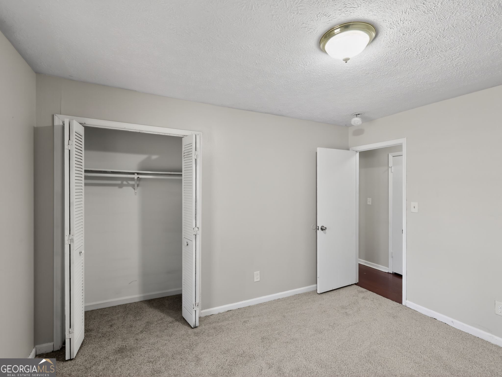 556 Roy Huie Road Riverdale, GA 30274 - Photo 19 of 31 an empty room with closet area
