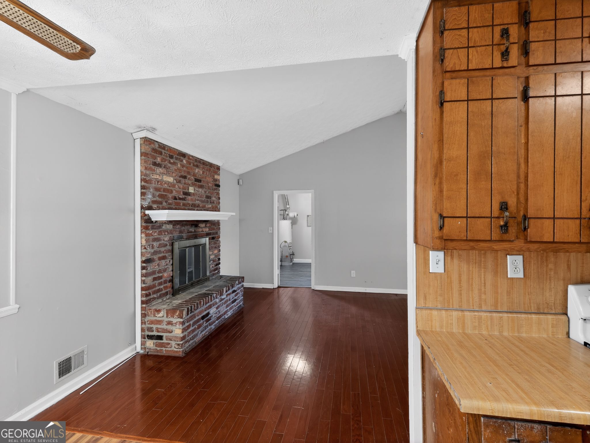 556 Roy Huie Road Riverdale, GA 30274 - Photo 4 of 31 a view of wooden floor and windows in a room