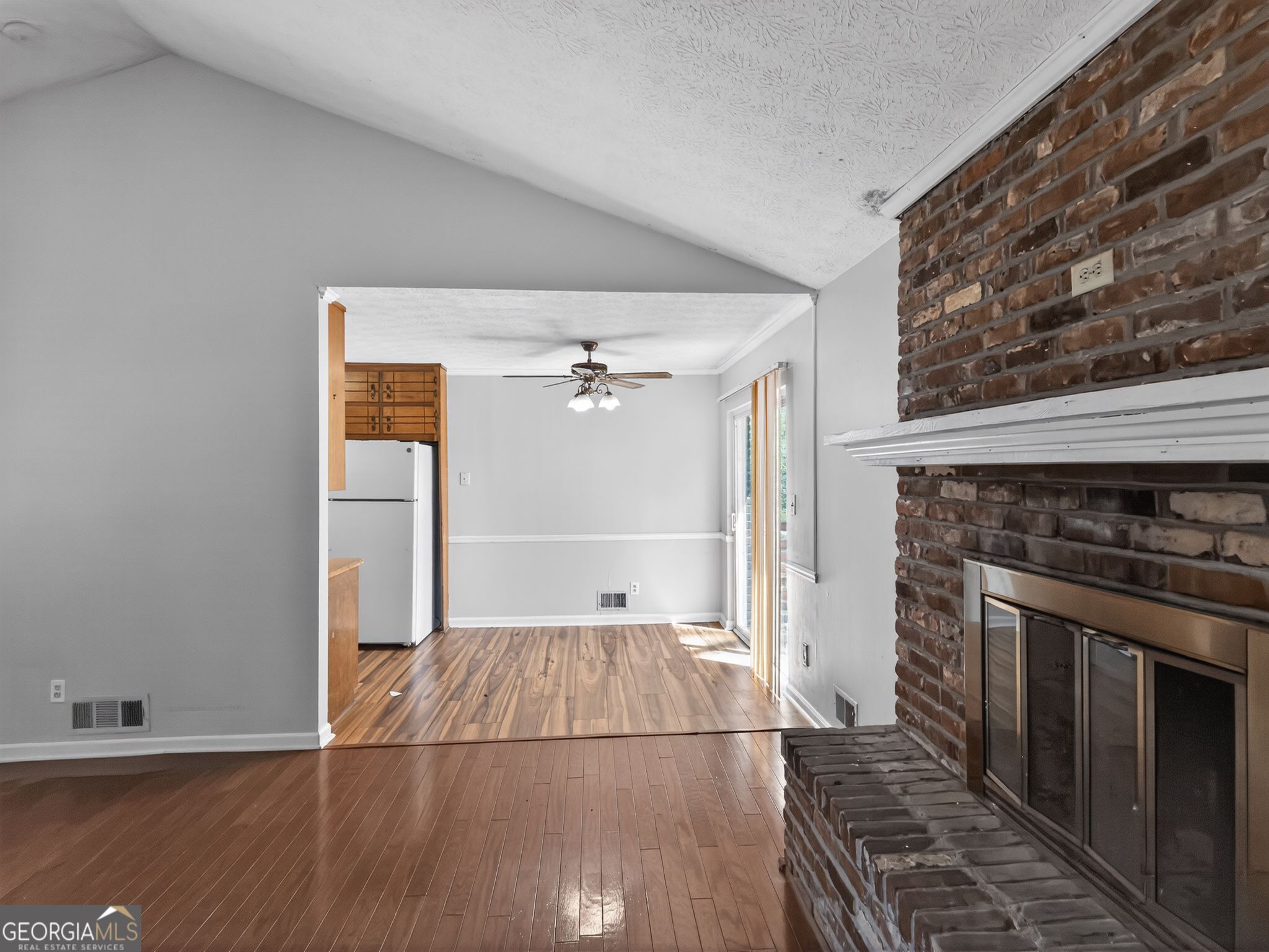 556 Roy Huie Road Riverdale, GA 30274 - Photo 5 of 31 a view of a kitchen from a hallway