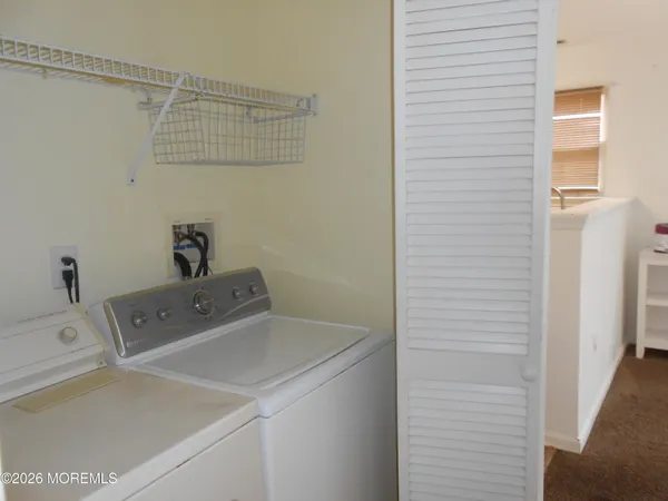 a bathroom with a sink and cabinets