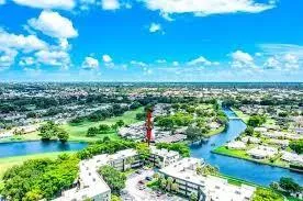 a view of a lake with a city