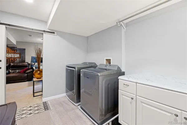a utility room with dryer and washer