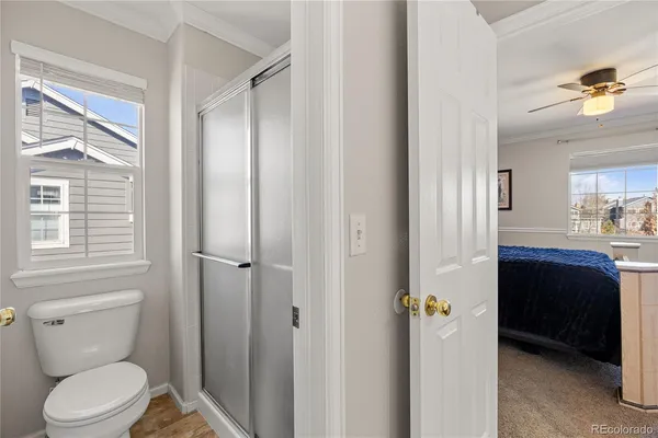 a bathroom with a toilet a sink and bathtub